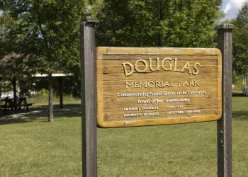 A wooden sign for Douglas Park