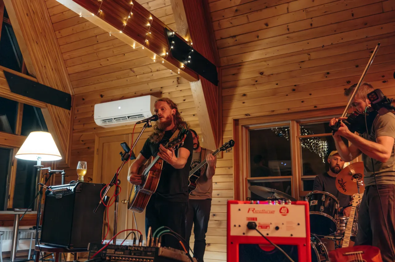 A band plays music live at New Vida Preserve.