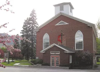 Brick exterior of the front entrance of the church