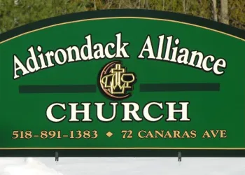 Green sign for the adirondack alliance church