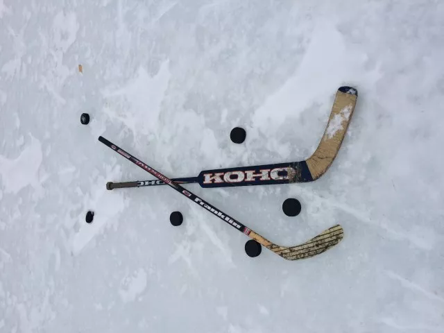 Our trusty thrift shop hockey equipment.