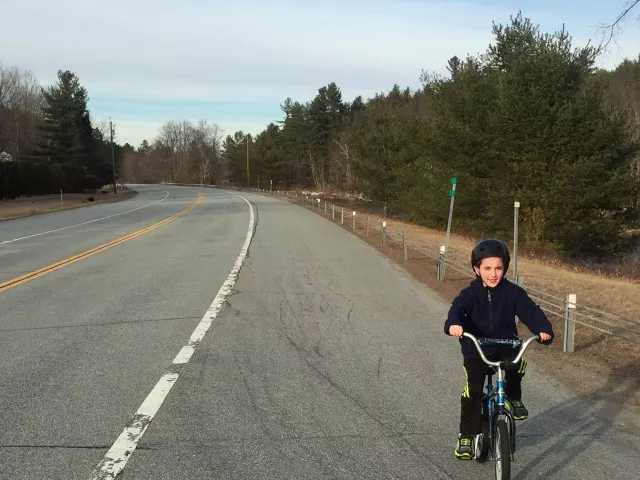 Awesome, clear, paved roadway! Perfect for this young rider!