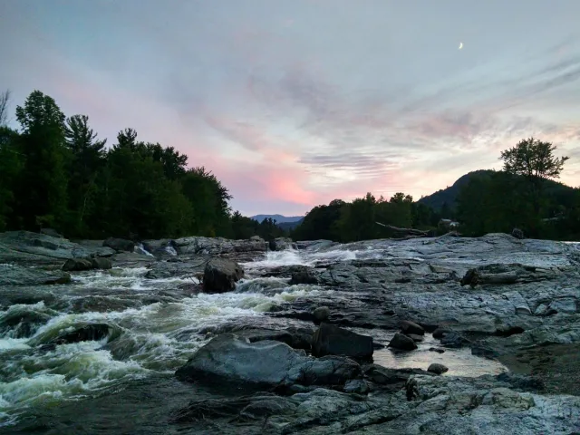 Rapids at night during sunset.