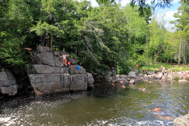 I'm not brave enough to jump from the top ledge. I prefer to jump where the kid wearing the blue shirt is standing.