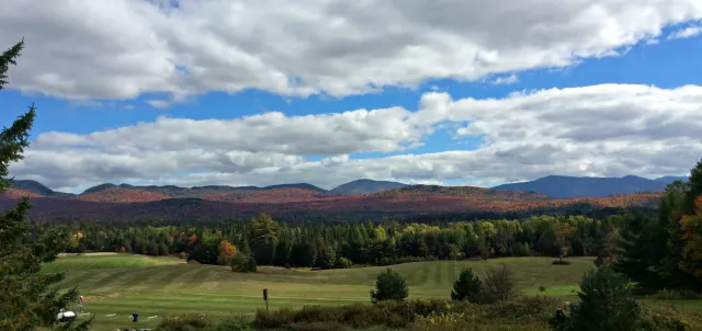 The sweep of the golf courses creates a wonderful mountain vista.