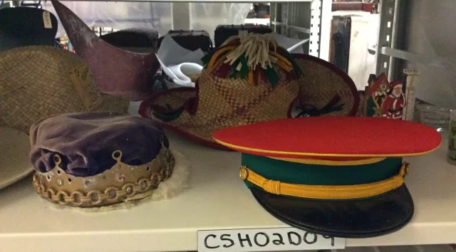 The items in this varied hat collection were once worn by performers at the Land of Makebelieve.