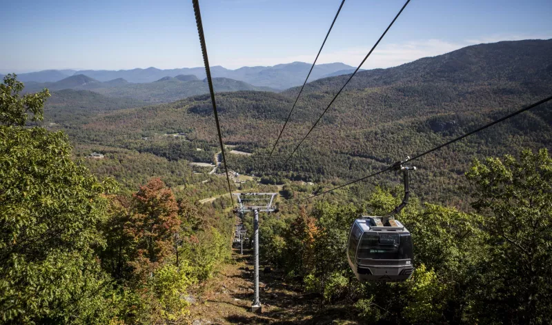 Sit back and enjoy the gondola ride to the summit of Little Whiteface.