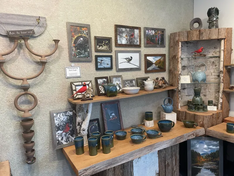 A collection of bird photos and handmade pottery