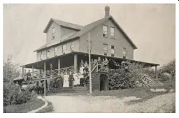 an old farm house in the 1800's with exposed porch.