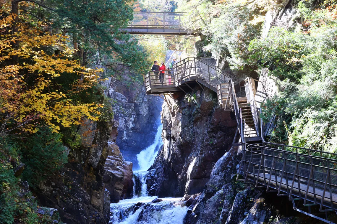 Waterfalls surrounded by observation decks and trees with fall leaves